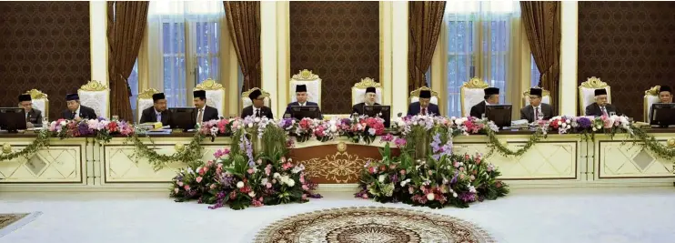  ??  ?? In conference: Sultan Muhammad V flanked by Sultan Nazrin and Dr Mahathir with the Conference of Rulers at Istana Negara in Kuala Lumpur.