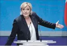  ?? MICHEL SPINGLER THE ASSOCIATED PRESS ?? French far right leader Marine Le Pen has proposed a name change for the National Front to National Rally to symbolize an identity makeover.