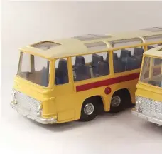  ??  ?? Dinky Toys Vega Major Luxury Coach Swiss Postal Bus (No 961) with dark blue or light blue interiors.