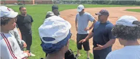  ?? FRANK DIRENNA/COLUMBUS DISPATCH ?? Eastmoor Academy coach Alphonso Meadows Jr. talks to his team during practice Thursday. The Warriors host Centennial in the City League title game on Tuesday.