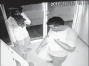  ?? HT PHOTO ?? CCTV footage showing the miscreants looting an ATM.