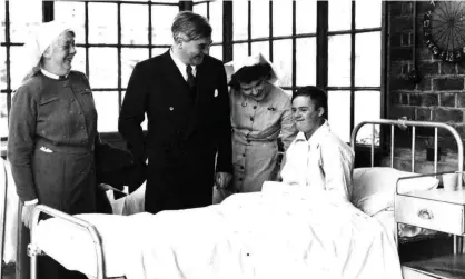  ?? Photograph: Trafford Healthcare NHS/PA ?? Aneurin Bevan visits Park Hospital in Manchester, the first NHS hospital, in July 1948.