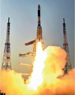  ??  ?? UP IN SMOKE
The GSLV-F08, carrying the GSAT-6A satellite, blasts off from Sriharikot­a