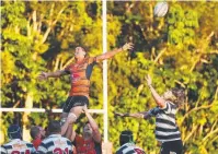  ??  ?? FLYING: Mudcrab Thomas Fayet reacts after a line out.