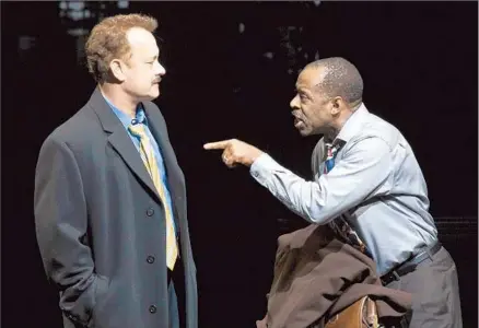  ?? Joan Marcus ?? TOM HANKS, left, makes his Broadway debut as a pugnacious journalist alongside Courtney B. Vance’s city editor in “Lucky Guy.”