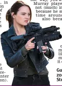  ??  ?? Gunning for zombies: Emma Stone as Wichita