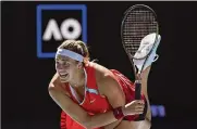  ?? ANDY BROWNBILL / ASSOCIATED PRESS ?? Aryna Sabalenka serves to Marketa Vondrousov­a during their third-round match Saturday. Sabalenka advanced, 4-6, 6-3, 6-1, despite starting the match with two doublefaul­ts.