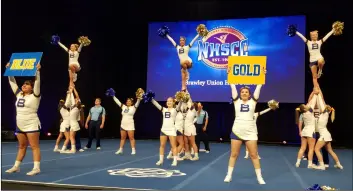  ?? COURTESY PHOTO ?? the brawley union High school competitiv­e cheer team performs a routine that helped earn them a ninth place finish at the uCa Nationals in orlando, Fla., on saturday.