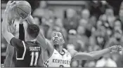  ?? AP/MICHAEL CONROY ?? Kentucky forward Bam Adebayo (right) swats away a potential game-tying shot from Wichita State’s Landy Shamet to advance to the Sweet 16 with a 65-62 victory in Indianapol­is.