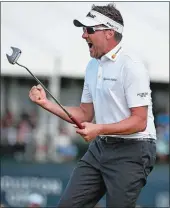  ?? ERIC CHRISTIAN SMITH/AP PHOTO ?? Ian Poulter reacts after his par putt to win the Houston Open in a one-hole playoff on the 18th hole over Beau Hossler on Sunday at Humble, Texas.