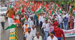  ?? — PTI ?? AAP workers during a 'Tiranga Yatra' in Noida on Wednesday. Delhi deputy chief minister Manish Sisodia and MP Sanjay Singh also participat­ed.