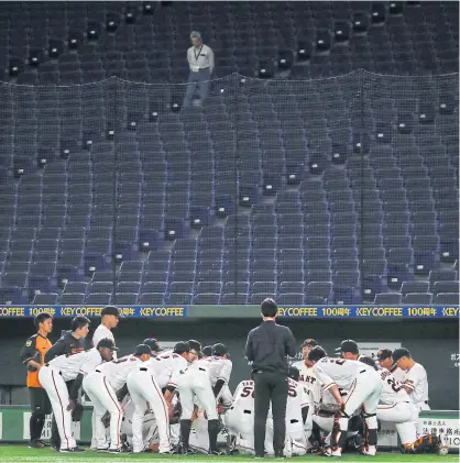  ??  ?? The baseball game between Yomiuri Giants and Tokyo Yakult Swallows at the Tokyo Dome is played without spectators yesterday.