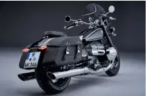  ??  ?? Left: The sleek new BMW R 18 cruiser with its two-cylinder boxer engine. Above: The BMW R 18 Classic with additional luxe features such as a large windshield and leather saddlebags