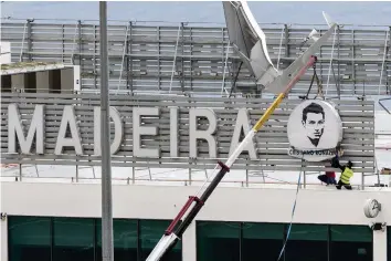  ?? GETTY IMAGES ?? Ronaldos Konterfei ziert den Flughafen Madeira, der nach ihm umbenannt wird.