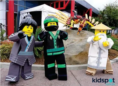  ?? PHOTO: NINA PROMMER/EPA ?? NEW KIDS ON THE BLOCK: Koko, Lloyd and Master Wu characters pose during a photo shoot for The Lego Ninjago Movie at Legoland in California.