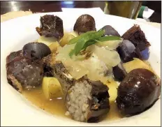  ?? Arkansas Democrat-Gazette/ERIC E. HARRISON ?? The Dublin Coddle, new on the menu at Dugan’s Pub, features pan-seared Pacific cod, Irish bangers, fingerling potatoes and onions in a bacon broth.