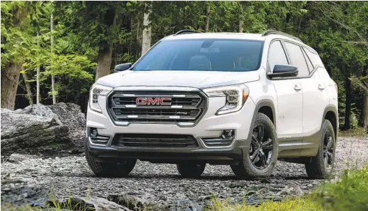  ?? GMC TNS ?? The GMC Terrain gets a face-lift in 2022, new fascia and grille designs across its lineup, as well as redesigned LED headlights and tail lights on all models.