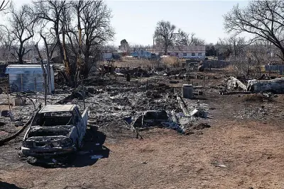 ?? ?? A truck and house destroyed by the Smokehouse Creek Fire are seen on March 1 in Stinnett, Texas. The wildfire has become the largest in state history at over 1 million acres. (Elías Valverde II/THE Dallas Morning NEWS/TNS)