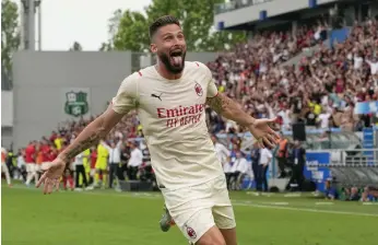  ?? AP ?? Olivier Giroud celebrates after scoring AC Milan’s second goal at Sassuolo on Sunday