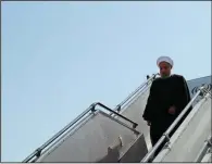  ?? AP/Iranian Presidency Office ?? Iranian President Hassan Rouhani arrives Thursday in Tehran after attending the U.N. General Assembly meeting in New York. He said the U.N. meeting showed America in “a unique historical and political isolation.”