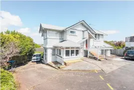  ??  ?? For sale: Left, the property at 627 Remuera Rd; right, the units in Kumeu.