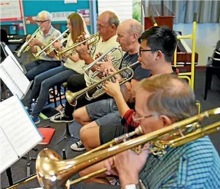  ?? MATTHEW CATTIN/STUFF ?? The horns fill out the back row of the Hibiscus Coast Concert Band, with members coming from as far afield as the North Shore and Warkworth.