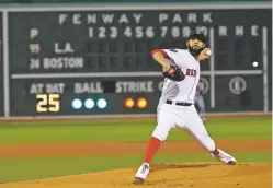  ?? MADDIE MEYER/ASSOCIATED PRESS ?? Red Sox starting pitcher David Price throws during Game 2 of the World Series against the Dodgers on Wednesday in Boston. Price pitched six innings of three-hit ball.