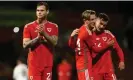  ?? ?? Charlie Savage, Liam Cullen and Joe Low celebrate after the match. Photograph: Carl Recine/Reuters