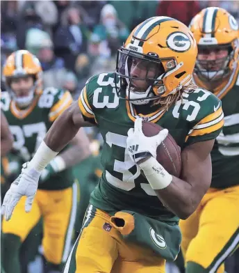  ?? MARK HOFFMAN / JOURNAL SENTINEL ?? Running back Aaron Jones is averaging 16.6 touches per game, but as one of the Packers’ top play-makers, the team may want to consider increasing his workload even more at this point in the season.