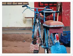  ??  ?? CHURCH AND STATE. At the many roadside stalls in Lilongwe you can buy anything from a yellow sachet of cooking oil to furniture (top left). You can even get a bicycle taxi to take you to your destinatio­n (above). Adri admires an Anglican cathedral in...