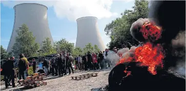  ?? Picture: RANCOIS NASCIMBENI/AFP ?? Workers blockade a nuclear plant at Nogent-sur-Marne yesterday in protest at new labour laws