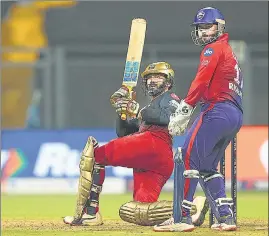  ?? BCCI ?? RCB’s Dinesh Karthik plays a shot during his match-winning unbeaten 66 off 34 balls against Delhi Capitals at the Wankhede stadium on Saturday.
