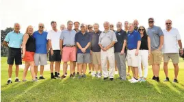  ?? COURTESY PHOTO/HOLLY FRYE-ATCHERSON ?? Hospice of the Chesapeake’s Golf Committee stands on a knoll near the clubhouse before the start of the tournament.