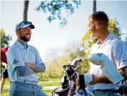  ?? JOSEPH CRAVEN / WRIGHT STATE ATHLETICS ?? Wright State coach Conner Lash (left) talks to senior Bryce Haney during the Dayton Flyer Invitation­al at NCR Country Club in October.