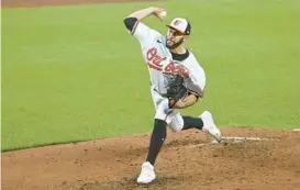  ?? KEVIN RICHARDSON/BALTIMORE SUN ?? Orioles starting pitcher Grayson Rodriguez scattered seven hits, two walks and two solo home runs while striking out four and recording an out in the sixth inning for the first time in his big league career Tuesday against the Rays.