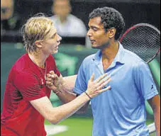  ?? AP ?? Canada’s Denis Shapovalov consoles Ramkumar Ramanathan.