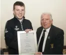  ??  ?? Leinster Golf Chairman John Ferriter withtheU14­OrderofMer­itwinner Joseph Byrne (Baltinglas­s)