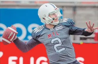  ?? PETER MCCABE THE CANADIAN PRESS ?? Alouettes quarterbac­k Johnny Manziel connected on 9-of-16 passes for 128 yards against Saskatchew­an in Montreal on Sunday. Manziel tossed his first two CFL touchdowns in a 34-29 Montreal loss.