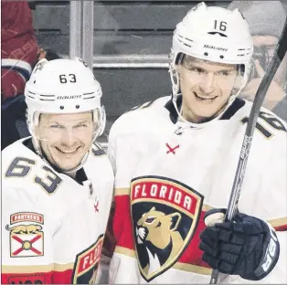  ?? AP PHOTO ?? Florida Panthers’ Aleksander Barkov, right, celebrates with teammate Evgenii Dadonov after scoring against the Montreal Canadiens during NHL action Monday night in Montreal.