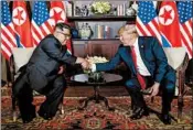  ?? EVAN VUCCI/AP ?? North Korea leader Kim Jong Un and President Donald Trump met June 12 in Singapore.