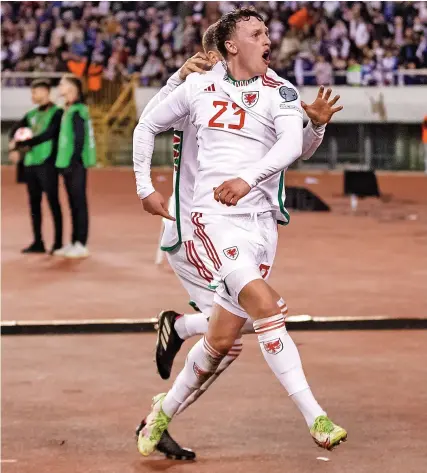  ?? Picture: John Smith/FAW ?? Nathan Broadhead shows his delight at scoring Wales’ stoppage-time equaliser