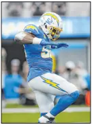  ?? Heidi Fang Las Vegas Review-journal ?? Chargers linebacker Khalil Mack celebrates one of his six sacks on Sunday.