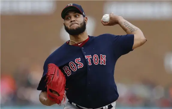  ?? ASSOCIATED PRESS ?? STARTING IN A NEW CITY: Eduardo Rodriguez pitches last night as the Red Sox opened a three-game series against the Tigers in Detroit. Rodriguez allowed one run and four hits while striking out four in five innings before the game was delayed more than two hours by rain.