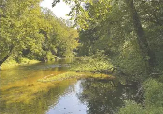  ?? COURTESY VIRGINIA OUTDOORS FOUNDATION ?? e Rappahanno­ck River runs along the Hitt property near Amissville, more of which was placed into easement last year.