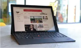  ??  ?? A computer squeezed into an 8.9mm thick tablet ... the ThinkPad X1. Photograph: SamuelGibb­s for the Guardian