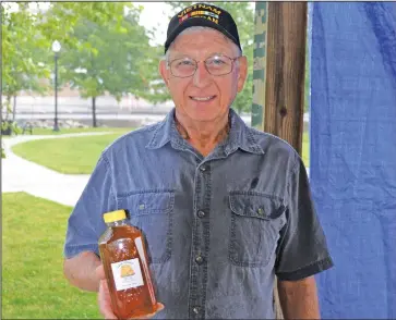  ??  ?? The Shelby Farmers’ Market is introducin­g vendor Hagar Hicks. “Hagar is a longtime Shelby resident who keeps bees and sells nature’s natural sweetener -- honey,” market manager Aileen Stewart noted in an email. “Hagar was influenced by his dad’s younger brother when it came to keeping bees. He said his uncle just showed up one day and said, ‘You have lots of property, you should get bees!’” And that is just what Hagar did more than 20 years ago, Stewart noted. “Hagar has the usual beekeeping equipment including protective gear and a smoker, and says the biggest threat to his bees are mites, which are difficult to treat,” Stewart wrote. “As Hagar puts it, ‘It’s hard to remove bugs from bugs,’” Stewart added. The Shelby Farmers’ Market hours are 9 a.m. to noon Saturdays in the pavilion area of Black Fork Commons. The market began its 2021 run on Saturday, June 12. The season is being extended until the last Saturday in September this year, Stewart has announced. The market is continuing the use of customer loyalty cards, which when full, can be entered into the year-end prize drawing, Stewart said.