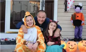  ?? Photograph: Natalie Salvatore ?? Alfred Salvatore with his daughters. ‘My husband was a healthy 47-year-old man with no prior health conditions and it took his life,’ said his wife, Natalie.