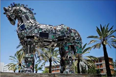  ?? REUTERS ?? A ‘Cyber Horse’, made from thousands of infected computer and cell phone bits, is displayed at the entrance to the annual Cyberweek conference at Tel Aviv University, Israel on Monday.