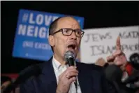  ?? The Associated Press ?? PEREZ: In this March 6 photo, Democratic National Committee (DNC) Chairman Tom Perez speaks at a protest against President Donald Trump's new travel ban order in Lafayette Square outside the White House in Washington. Navigating ongoing rifts on the...