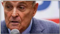  ?? (AP/Mary Altaffer) ?? Rudy Giuliani, shown speaking at a rally Monday, said on his radio show Thursday that the action against him “is happening to shut me up. They want Giuliani quiet.”